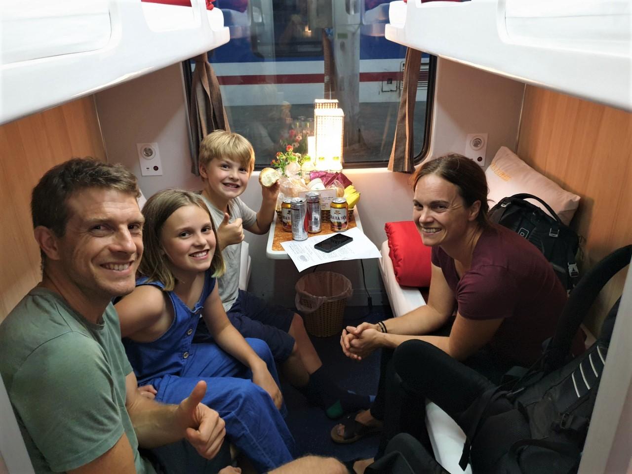 Foreign-tourists-travel-to-Hue-by-train-Viet-Nam